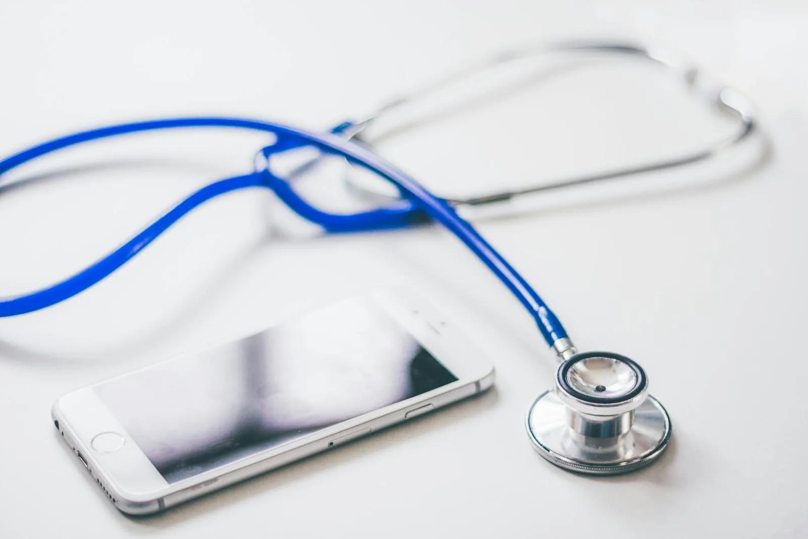 A stethoscope resting on a clean surface, symbolizing primary care